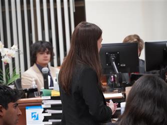 A close up of a Mock Trial matchups poster